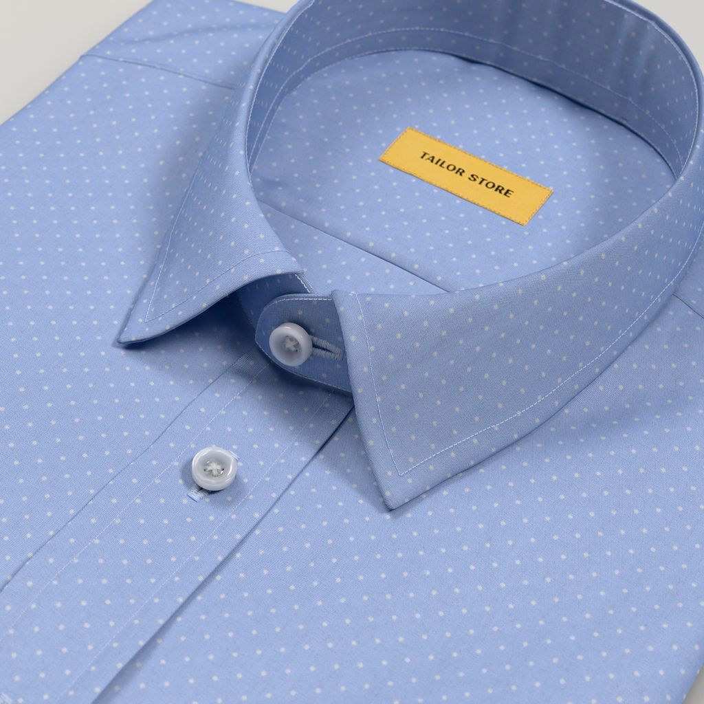 Chemise bleu clair à pois blancs