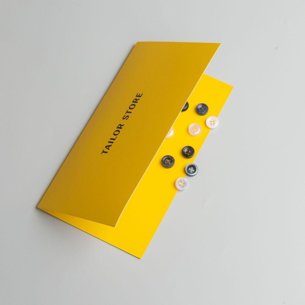 Sample book with shirt buttons