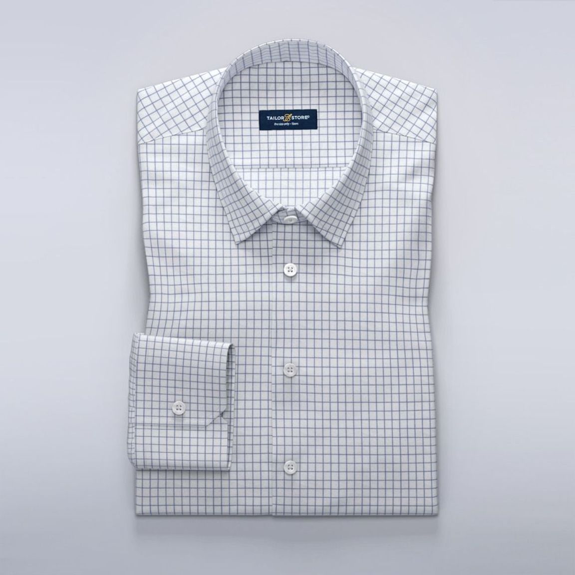 Business-skjorte for damer, i rutete mørkeblå og hvit twill.