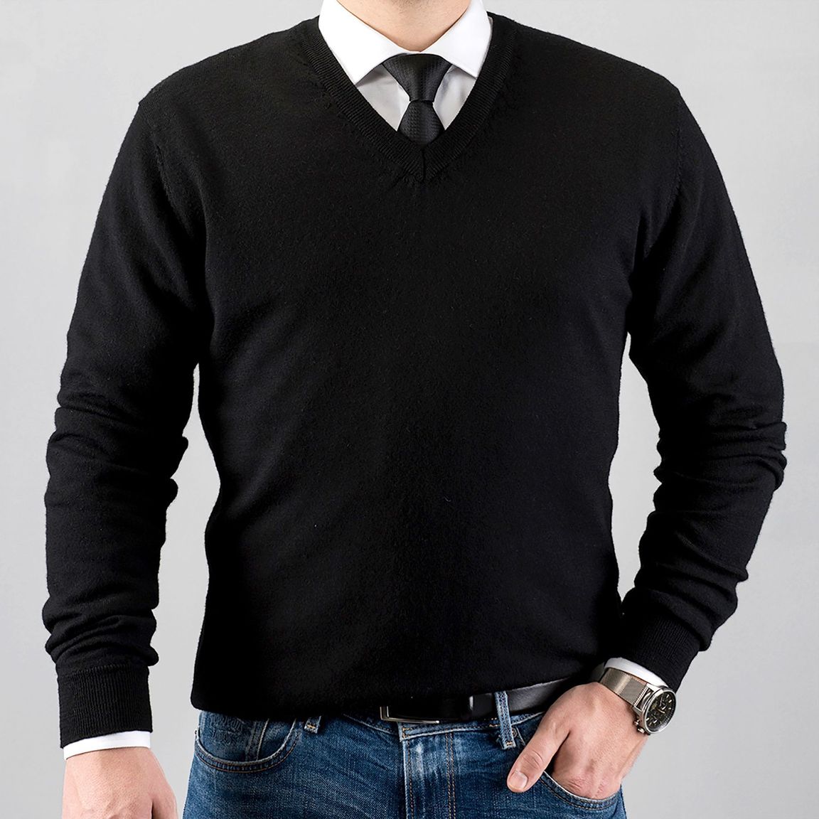 white t shirt under black v neck sweater