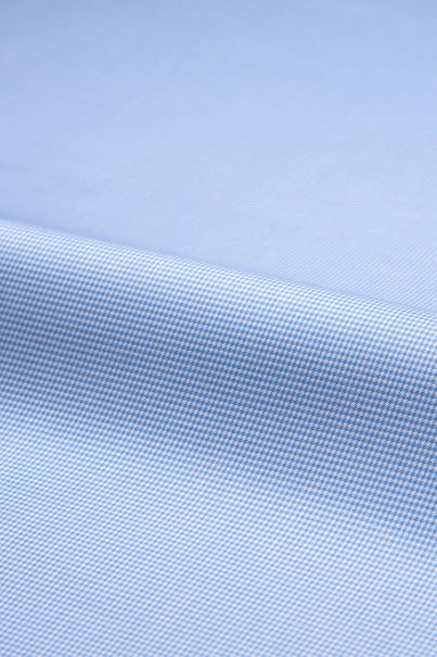 Non-iron business shirt in a light blue houndstooth pattern