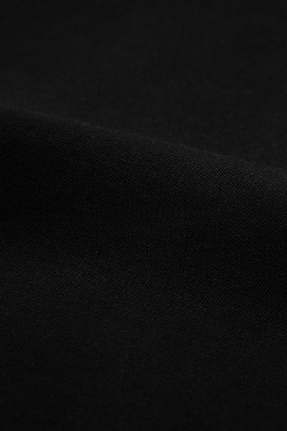 Black polo shirt