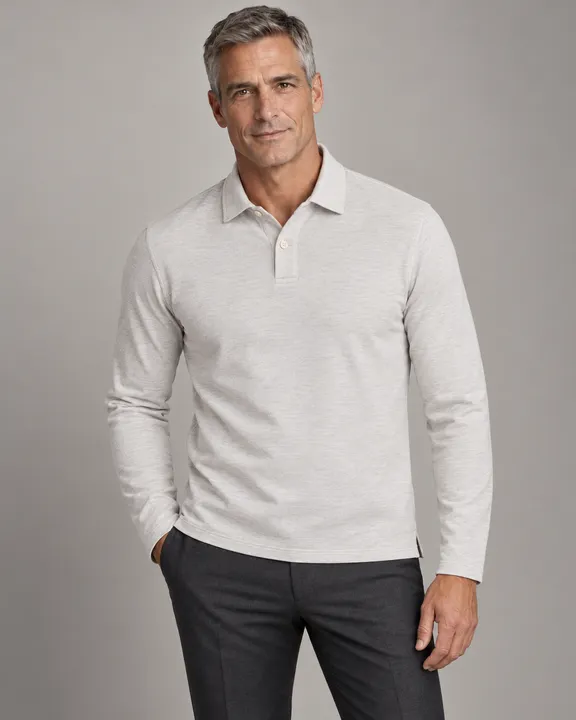 14342-heritance-beige-melange-polo_long_sleeve_polo_collar_two_buttons_fabric_4679_model_025_pose_015_polo_regular_material_pima_pique_bg_11_nopocket_untucked_e0g0h0_upper_body_three_quarter.png