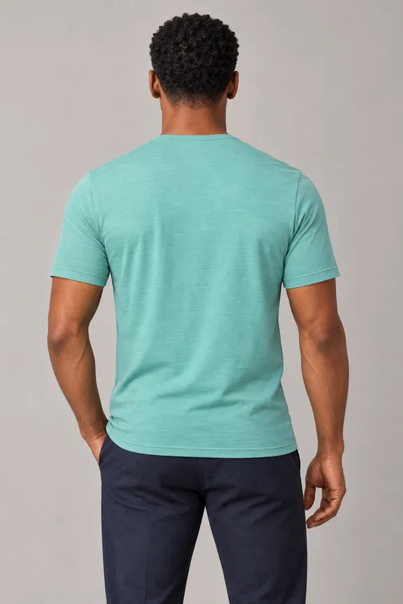 catalog/15919_tshirt_short_sleeve_crew_neck_stitched_fabric_5271_model_002_pose_012_tshirt_regular_material_merino_knit_bg_11_nopocket_untucked_e4g1h1_upper_body_back.png