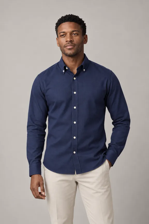 catalog/shirt_button_down_enkel_synlig_fabric_4292_model_002_pose_016_fit_001_front_material_oxford_002_bg_11_nopocket_untucked_e1g2h1_upper_body_front.png